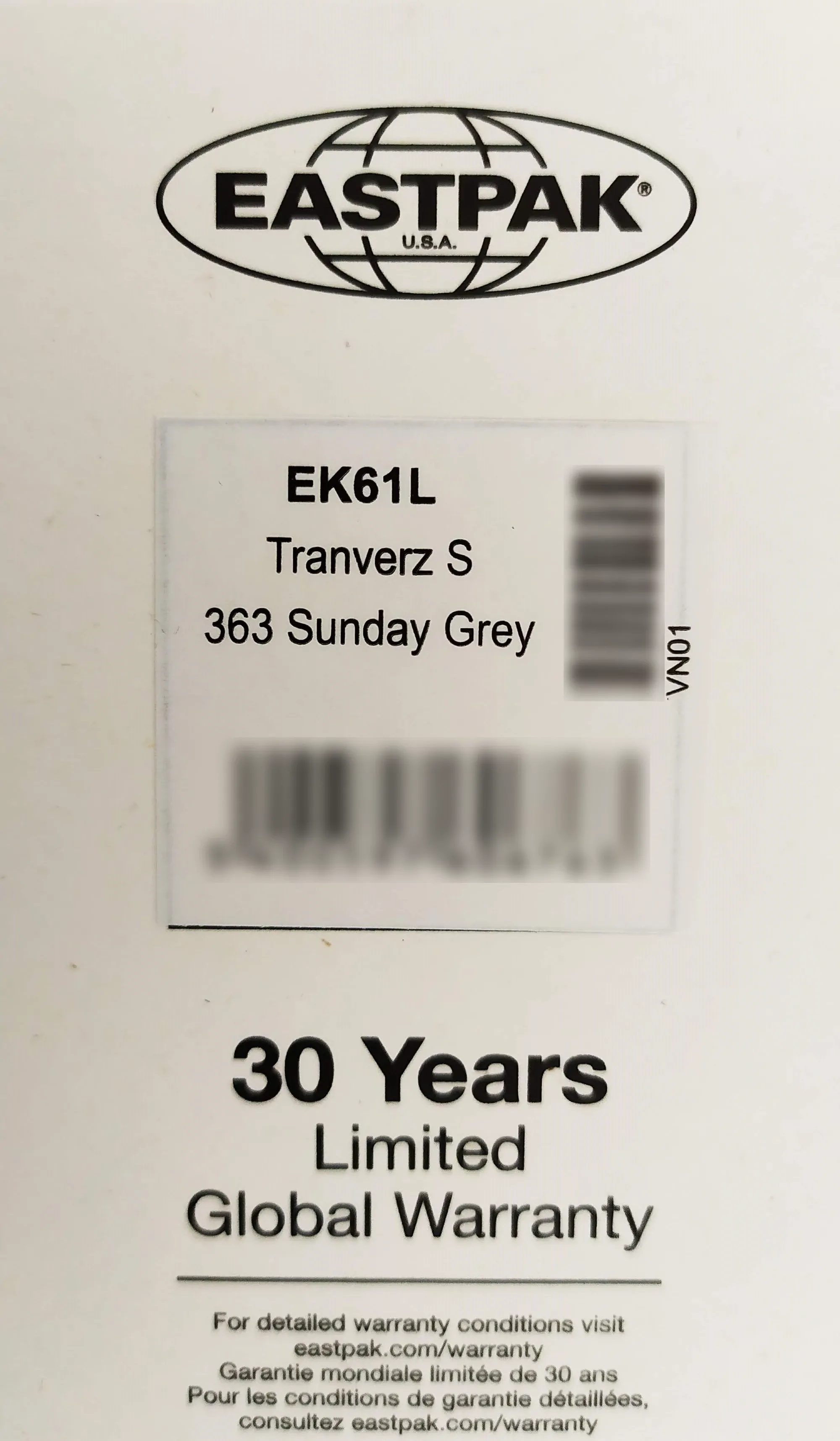 Etiquette de garantie 30 ans pour la valise souple Eastpak Tranverz